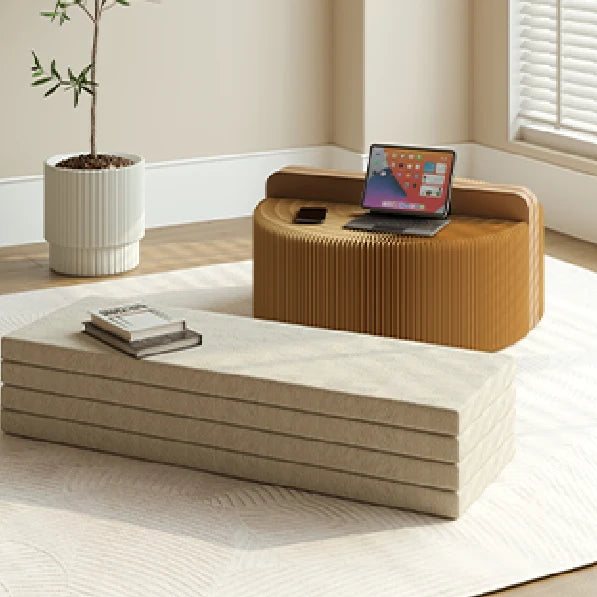 Foldable Paper Bed in a modern living room setting with natural light