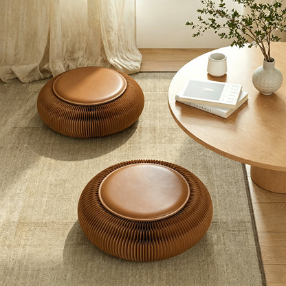 Round paper footstools in a modern living room