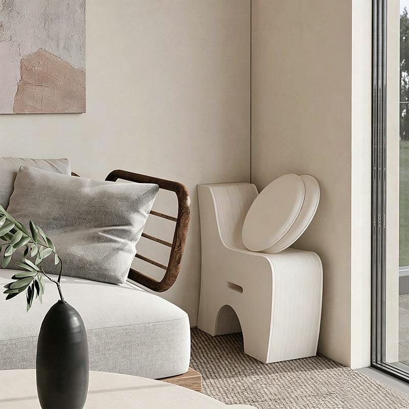 White paper lounge chair and continuous seating pieces in modern interior