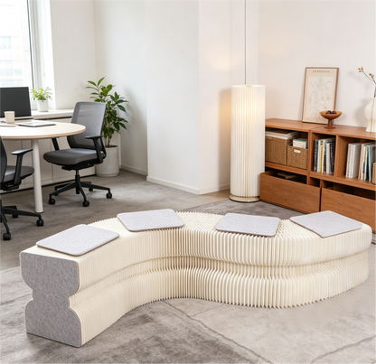 Curved Honeycomb Paper Sofa on a white background, shown from the front