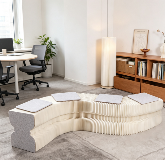 Curved Honeycomb Paper Sofa on a white background, shown from the front