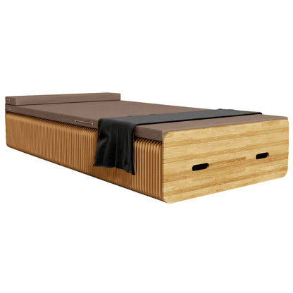 Foldable Accordion Paper Bed on a white background, shown from the front