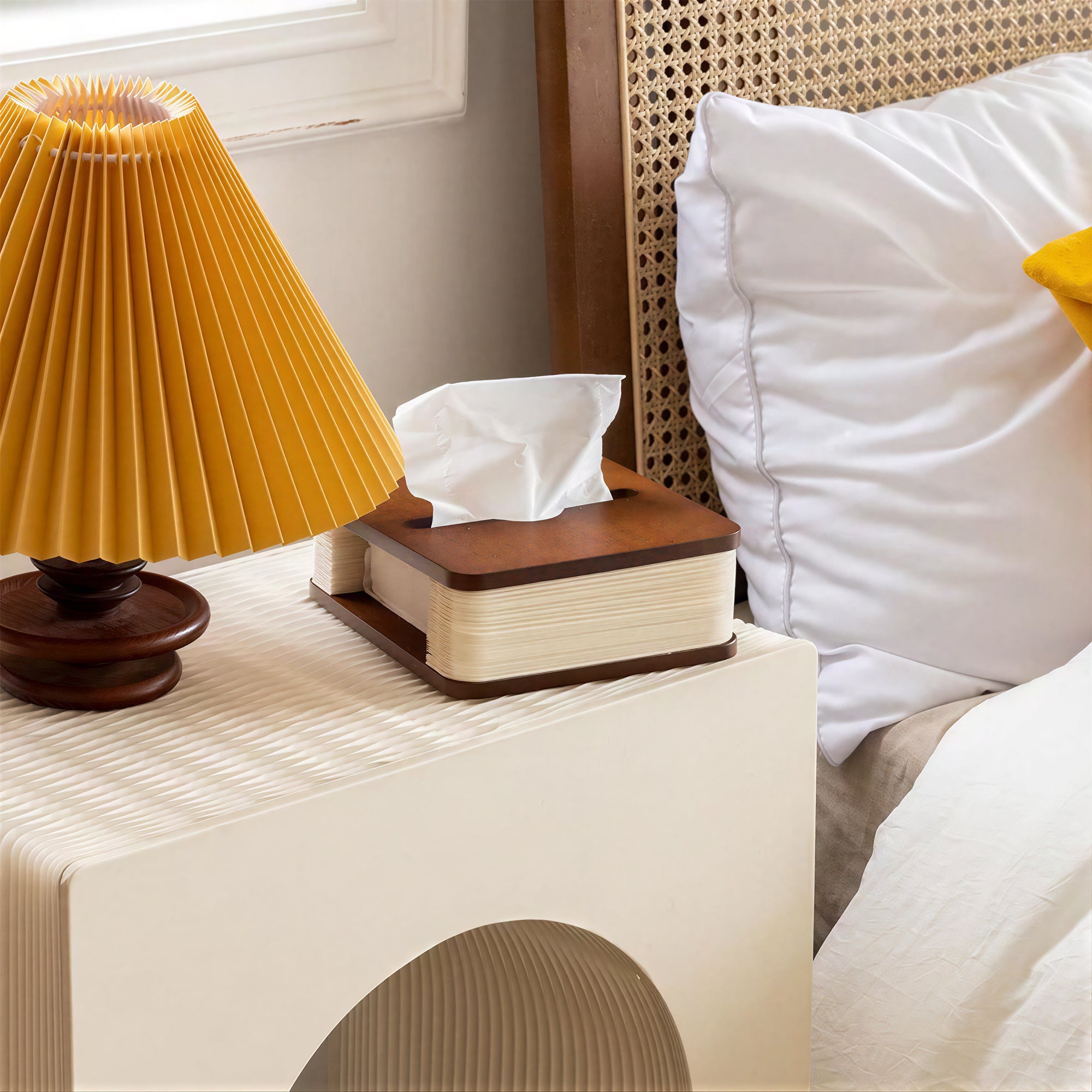 Yellow foldable pleated paper fan lampshade next to wooden tissue box – building distinctive retail and gift collections