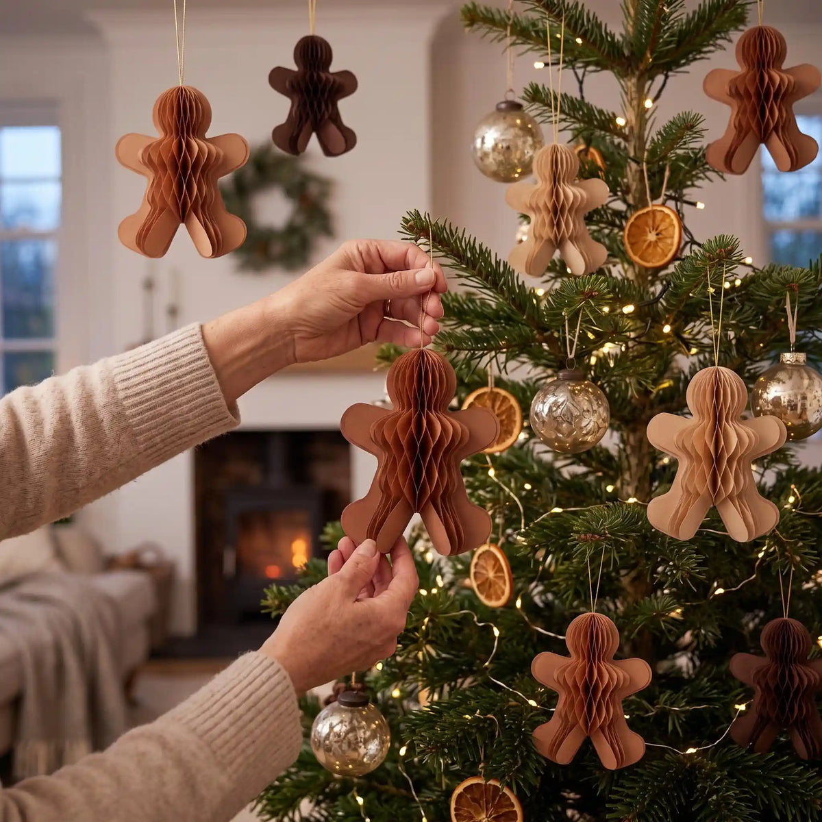 Folded Honeycomb Paper Gingerbread Ornaments for compact storage and shipping