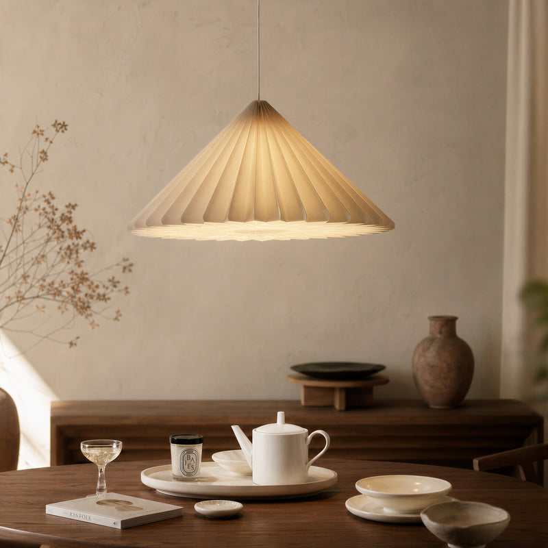 Premium interior appeal – cone-shaped origami paper pendant lampshade over dining table