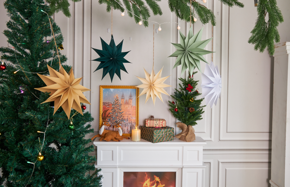 Star geometry development – multi-colored paper stars hanging as wall or window decorations