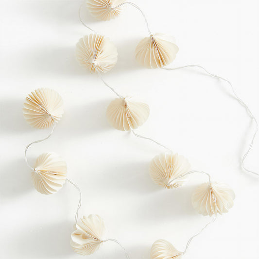 Cream Flower-Shaped Honeycomb Paper String Lights on a white background