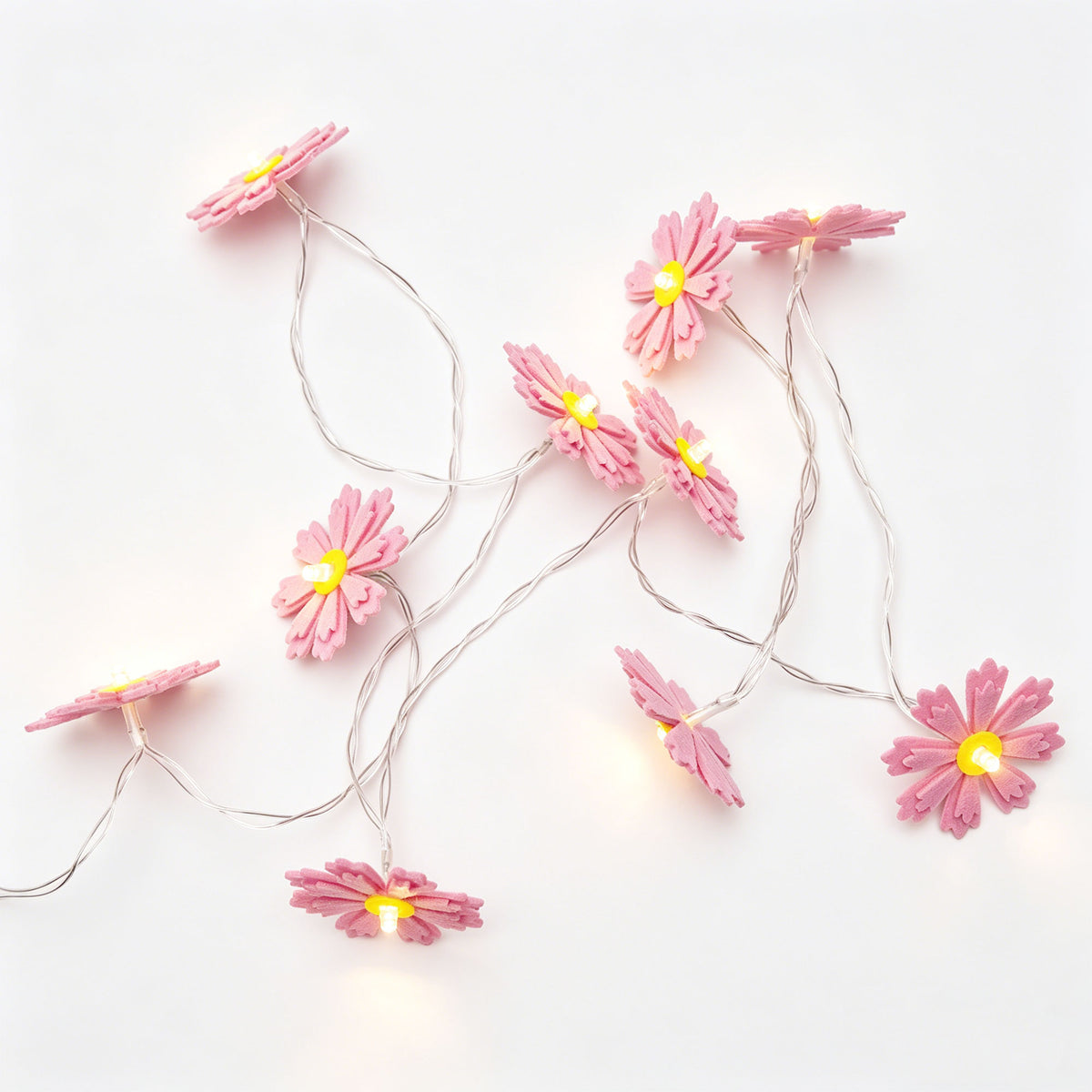 Pink Felt Flower String Lights on a white background, shown from the front