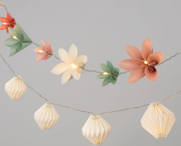 Floral origami paper string lights with folded decorative covers