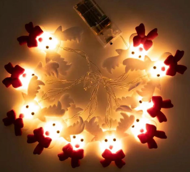 Warm illuminated Christmas felt string lights for seasonal displays