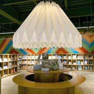 Colorful floral patterned origami paper pendant lampshade hanging indoors