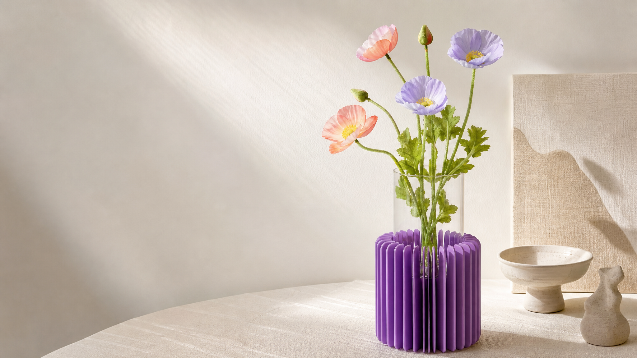 Foldable paper vases for design-led homeware and gift collections – purple honeycomb paper vase with glass cylinder and pink flowers