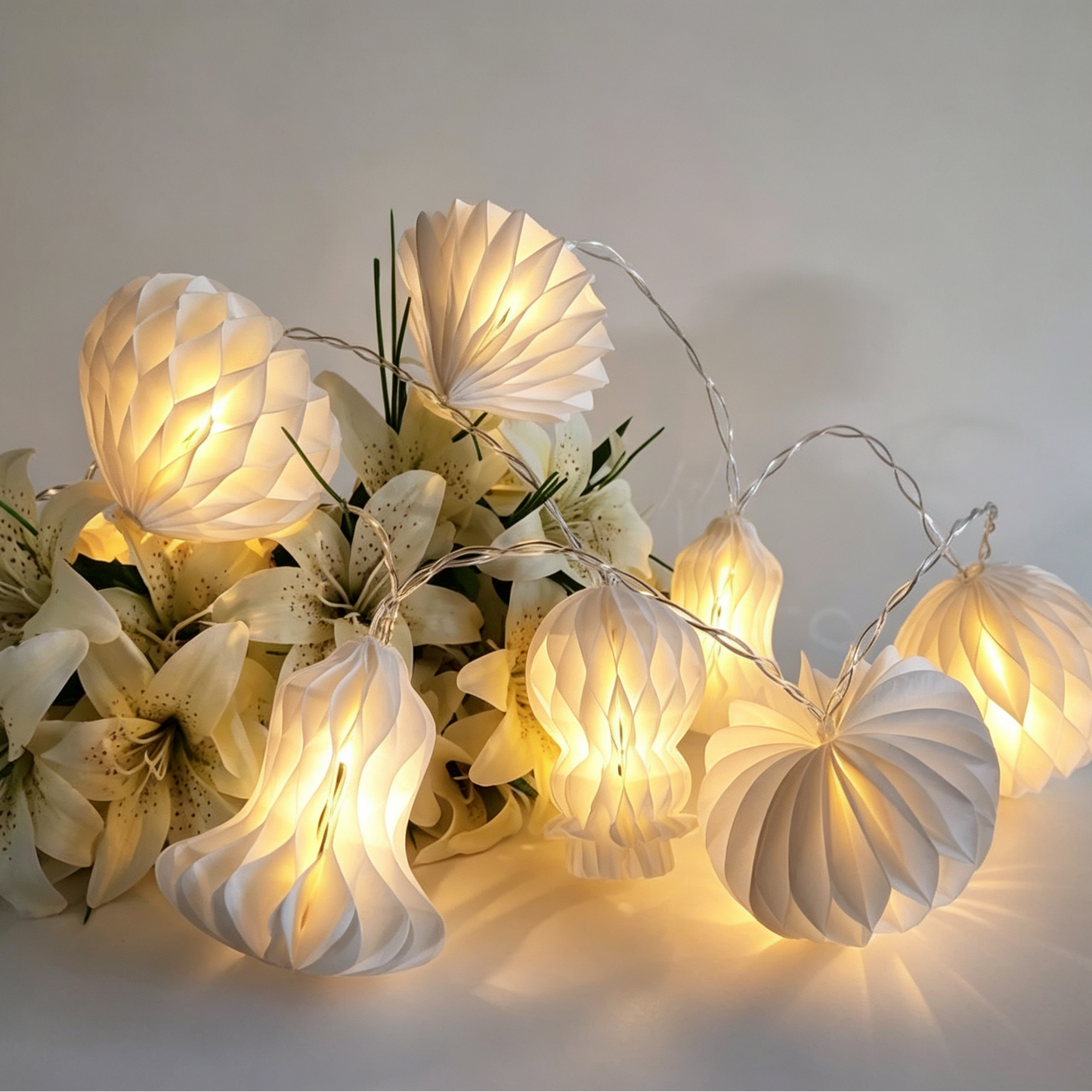 Mixed-Shape White Honeycomb Paper String Lights showing its structure