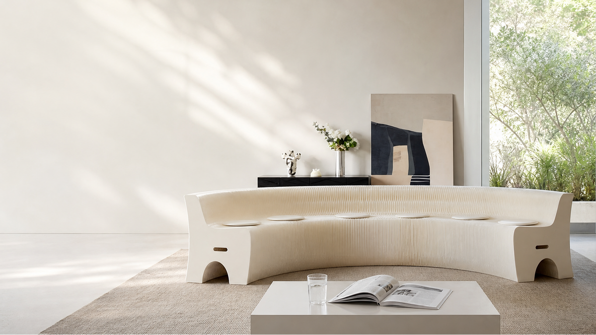 Foldable paper benches for flexible interior spaces – long curved white honeycomb paper bench in modern living room