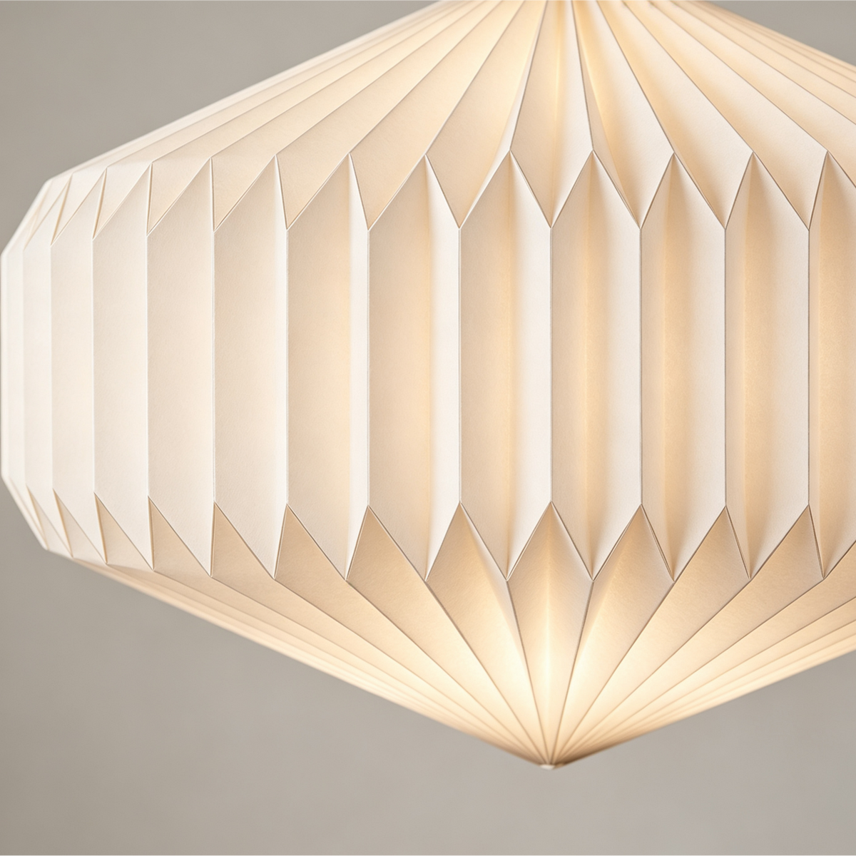 Folded Diamond Origami Pleated Paper Pendant Lamp for compact storage and shipping