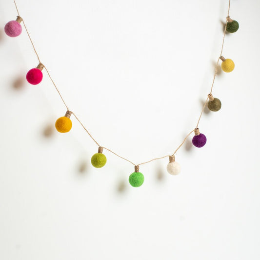 Colorful Felt Ball String Lights with Natural Jute Cord on a white background