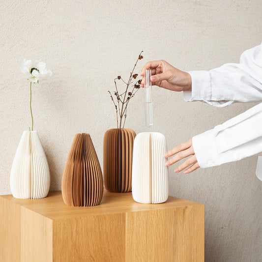 Custom Pleated Honeycomb Paper Vase Collection on a white background