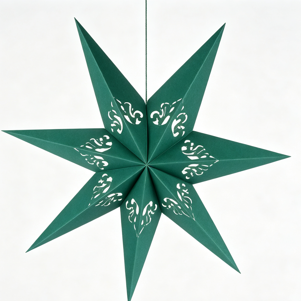 3D Cutout Paper Christmas Star Ornament on a white background