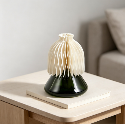 Honeycomb Paper Aroma Diffuser with Green Glass Bottle in a modern living room