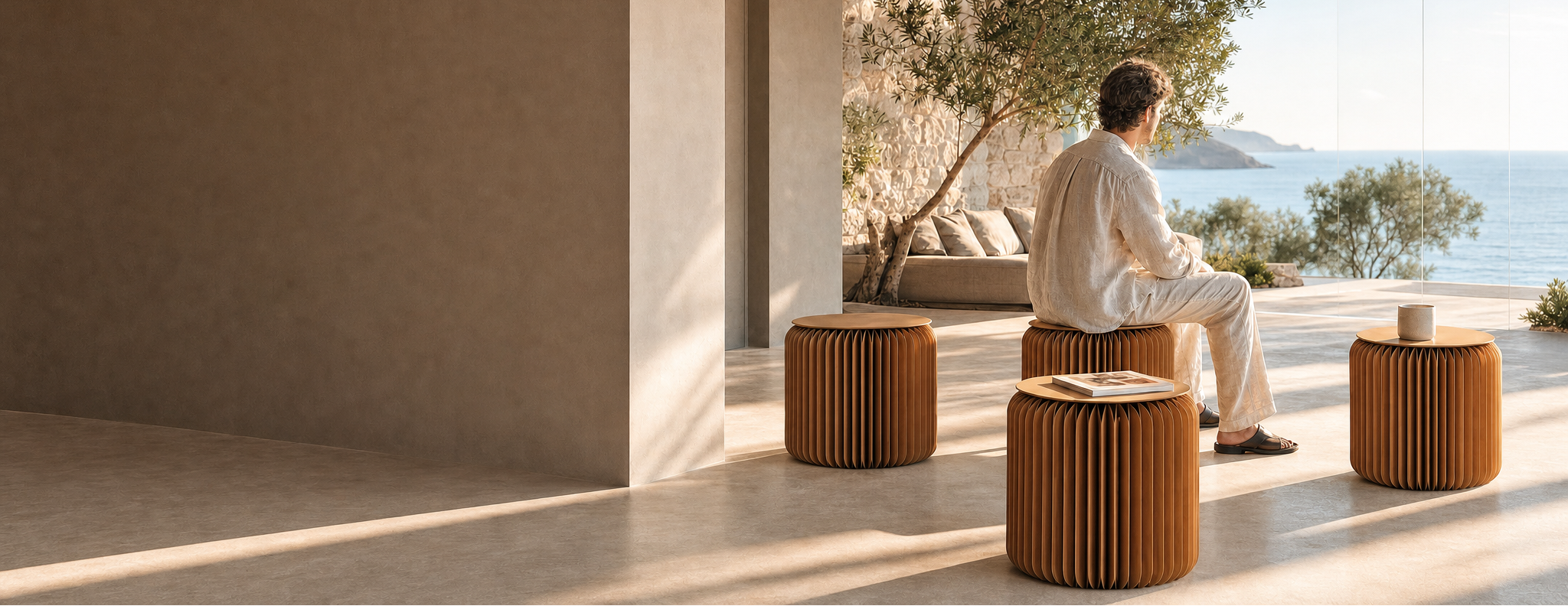 Foldable honeycomb paper stools for wholesale and custom projects – outdoor terrace seating with ocean view