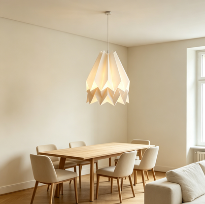 White Origami Paper Pendant Lamp in a modern living room setting with natural light
