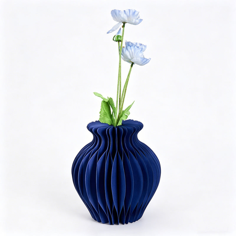 Blue honeycomb paper vase with flowers for interior decoration