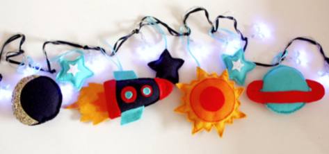 Custom layered felt string lights with colorful themed motifs