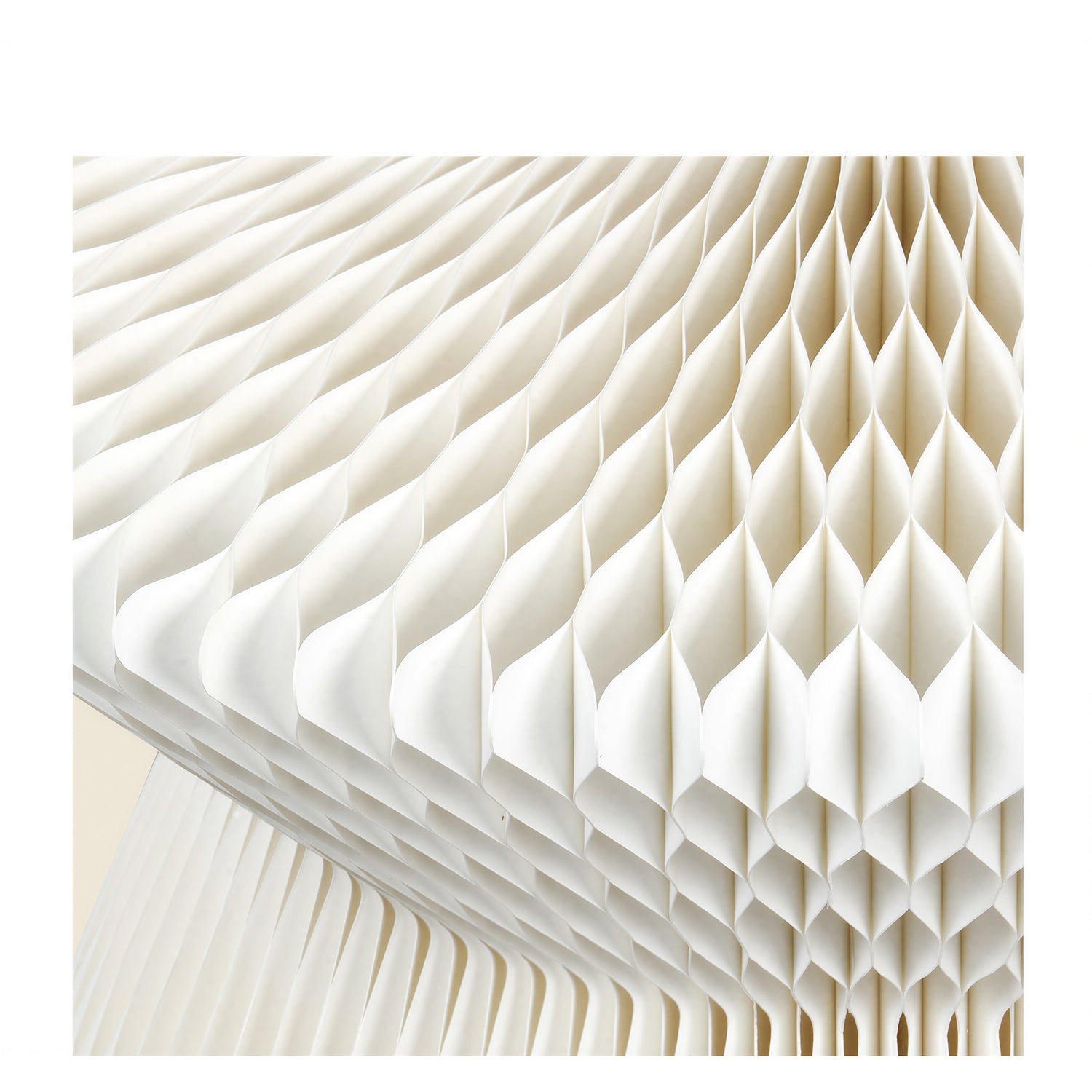 Close-up of expandable honeycomb paper structure used in foldable paper furniture