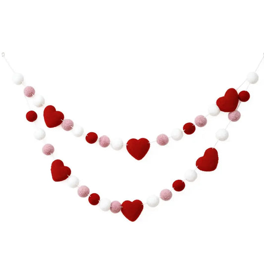 Felt Ball Heart Garland on a white background, shown from the front