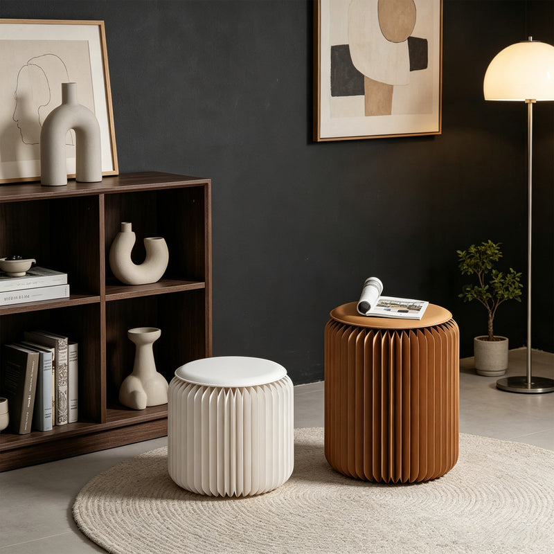 Two foldable honeycomb paper stools in a modern commercial interior