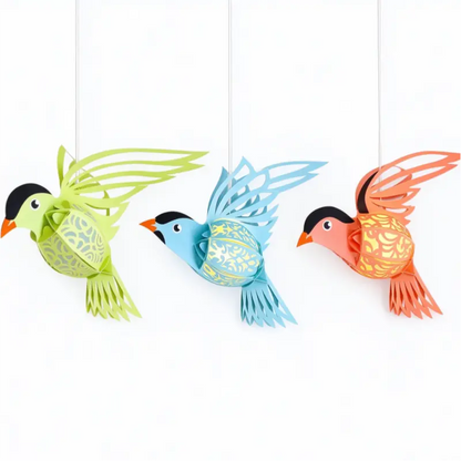 Colorful LED paper bird lanterns hanging beside a bright nursery window